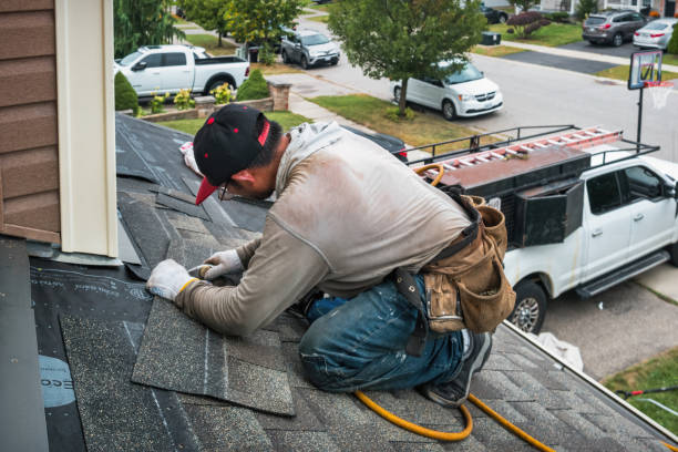Professional Roof Replacement technician working in Whittier, NC
